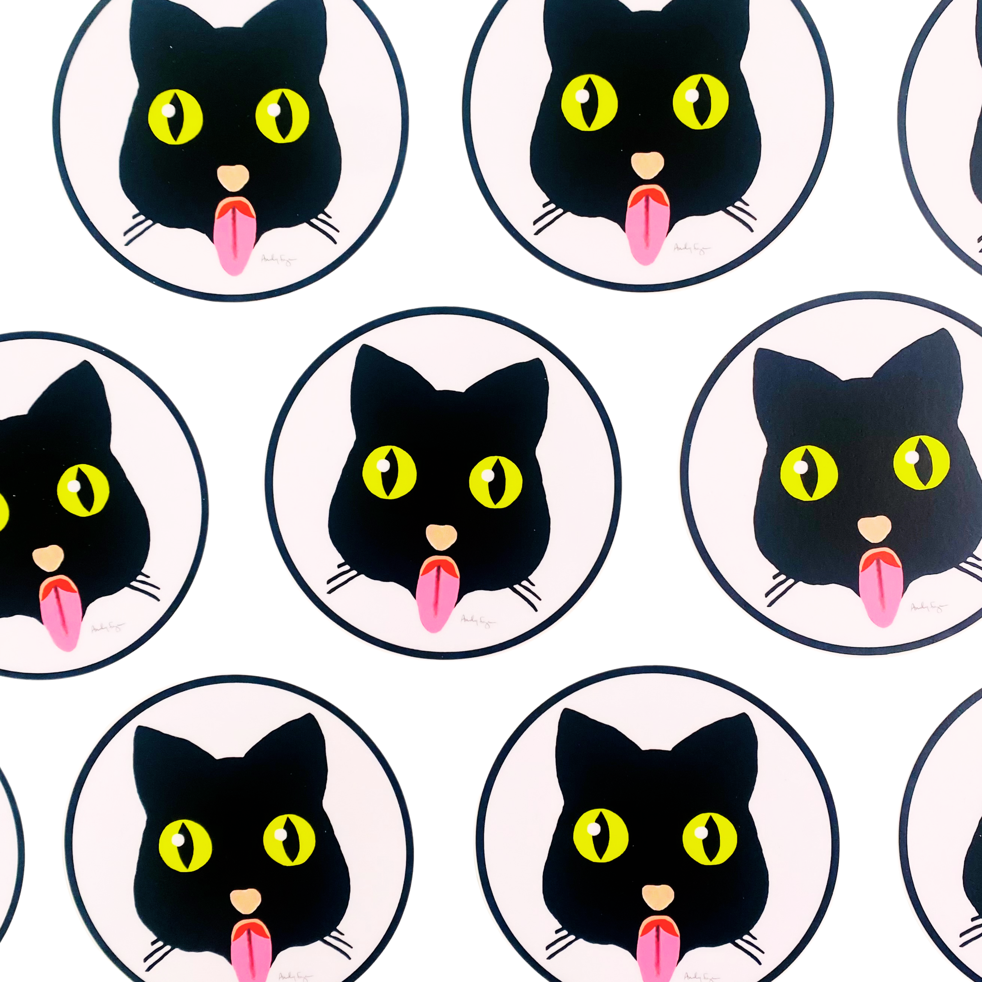 Pattern of black cats with yellow eyes and pink tongues on a white background